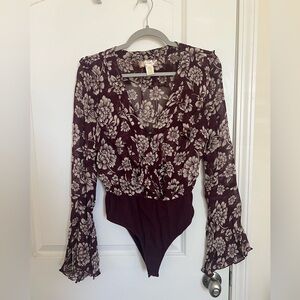 Bell sleeve body suit
